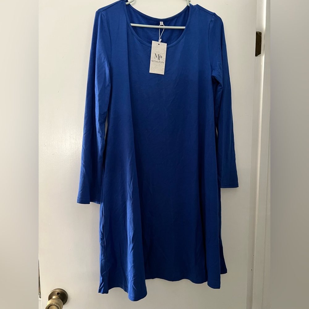 Mengpipi dress. Women’s large, never worn, and still has tags.